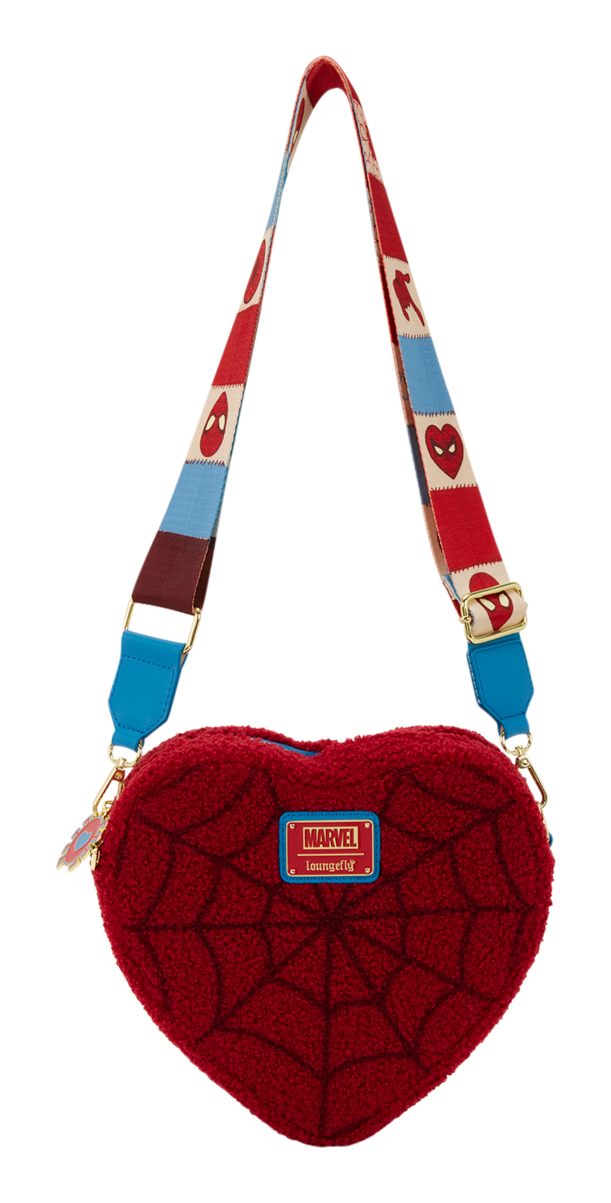 Heart-shaped red bag with spider web pattern and colorful strap on a white background