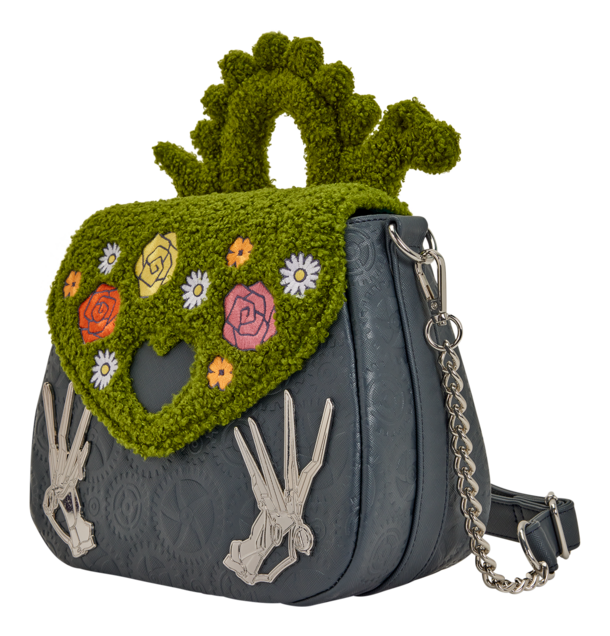 Gray handbag with green floral and skeleton design on a white background